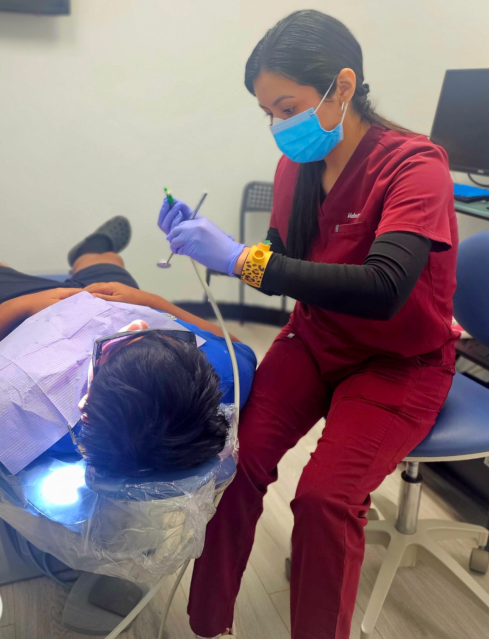 Tooth being brushed for whitening