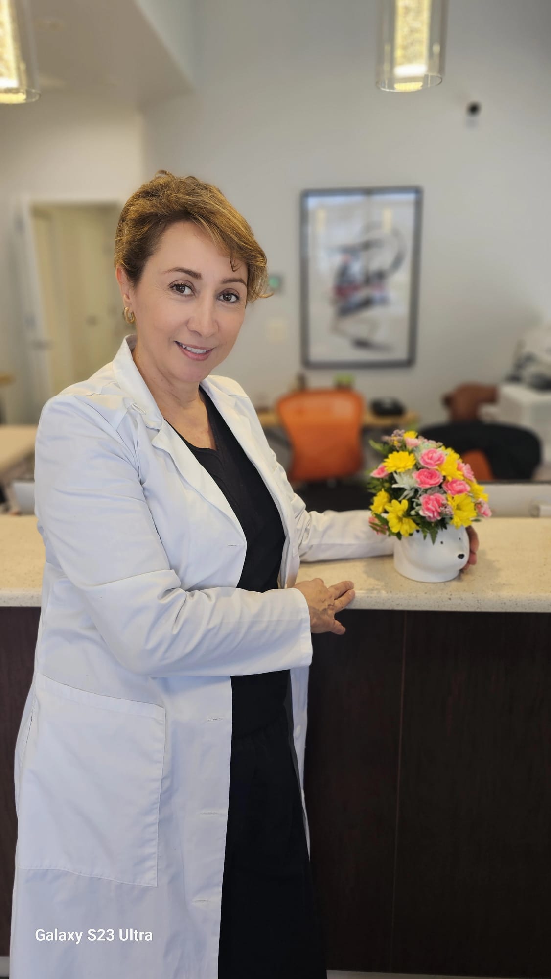 Tooth being brushed for whitening